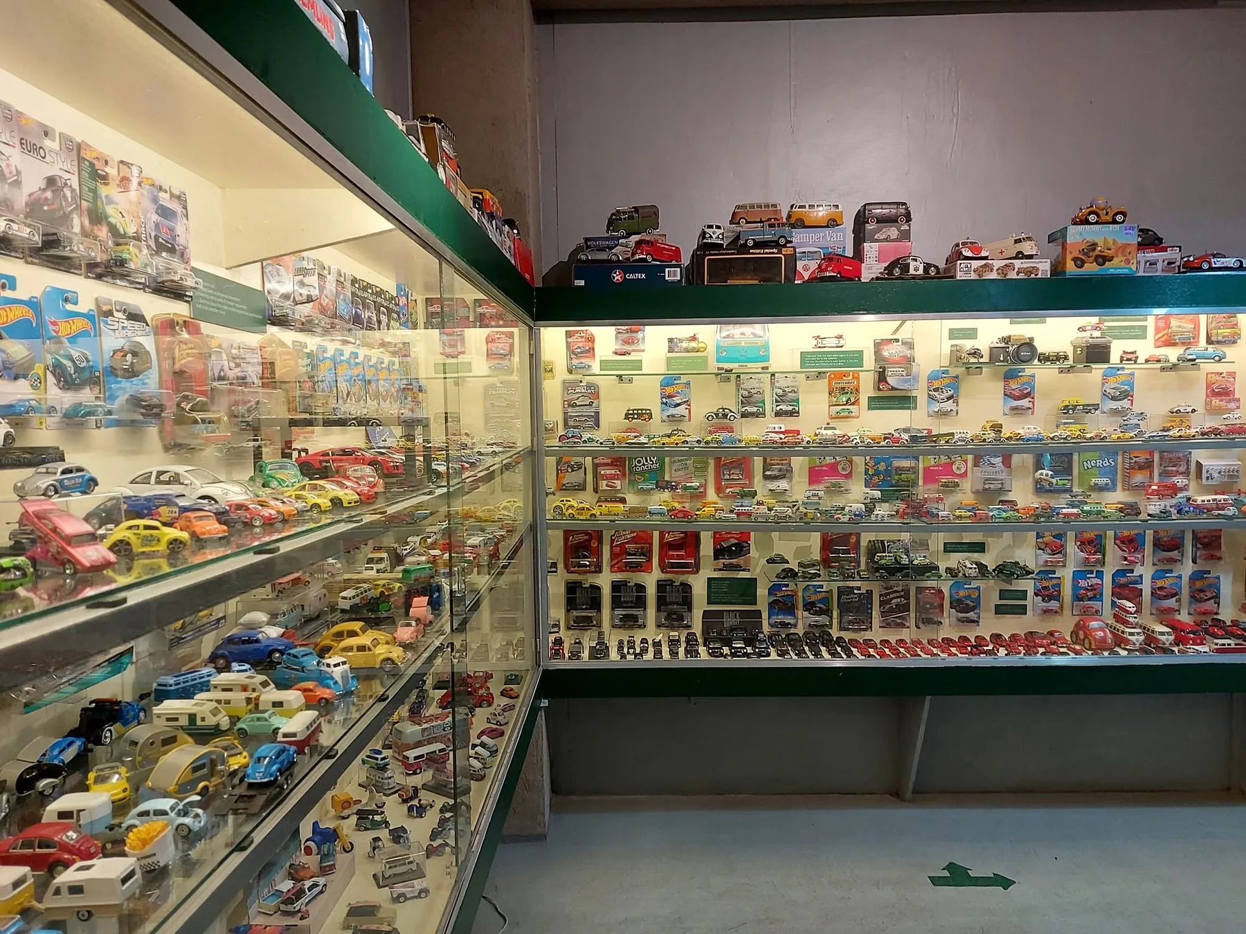 Display cases filled with Volkswagen miniatures at Campfolkswagen